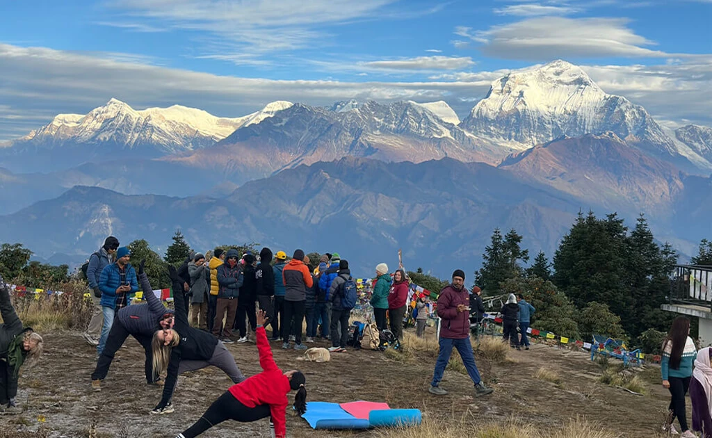 Trekkers enjoying Himalayan views from Poon Hill