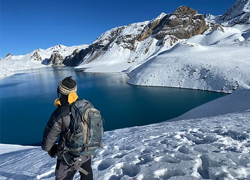 Tilicho Lake with snow-covered mountains